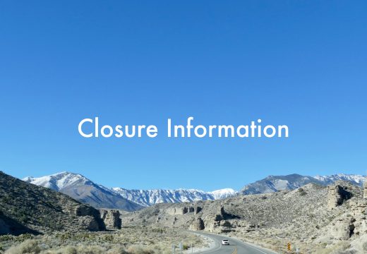 Closure information white words over a blue sky with Charleston peak in the background