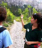 Trail Host gives directions to a hiker