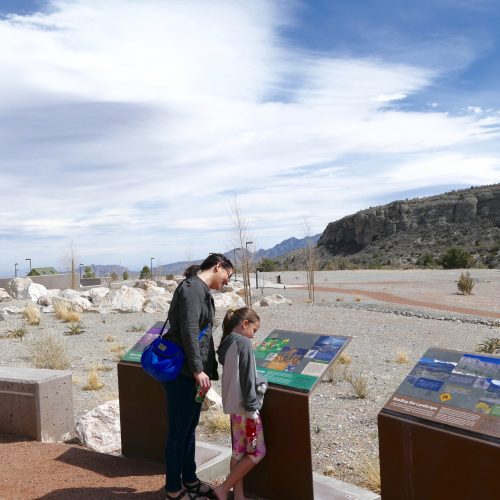 visitors read signs at the smvg